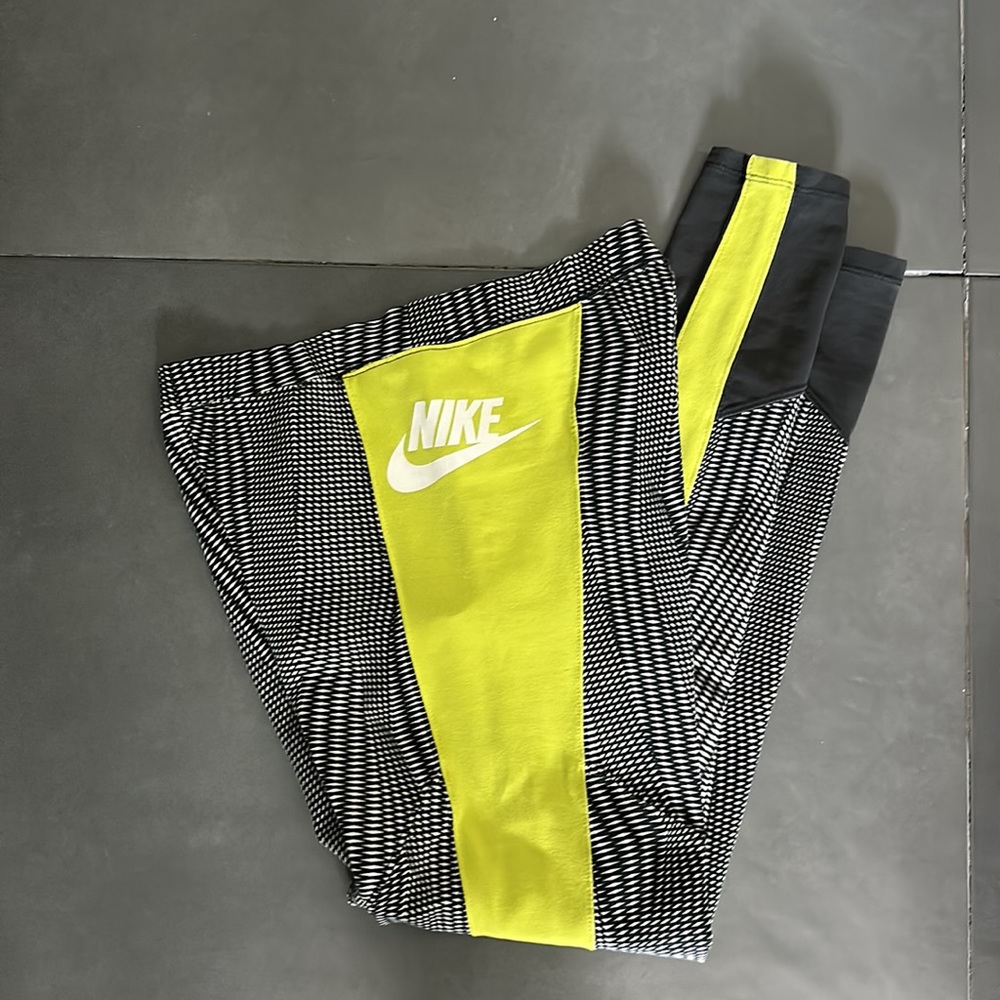 Nike running pants with a fun-faster than me design